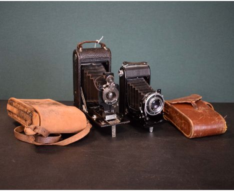 Cameras - Zeiss Ikon folding camera, together with a Kodak Junior No.1-A folding camera, each cased Condition: