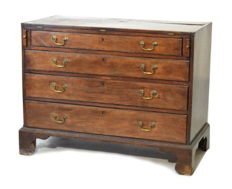 George III mahogany chest having a fold-over top, fitted four long graduated drawers and standing on bracket feet   Condition