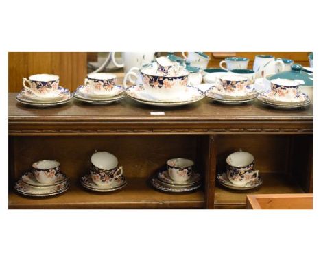 Early 20th Century tea service having iron red, blue and gilt floral decoration   Condition: 