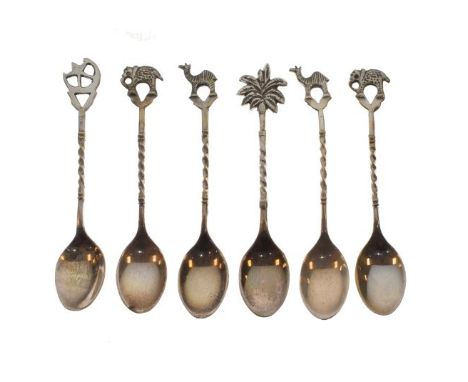Set of six Middle Eastern white metal coffee spoons, each having a decorative finial   Condition: 