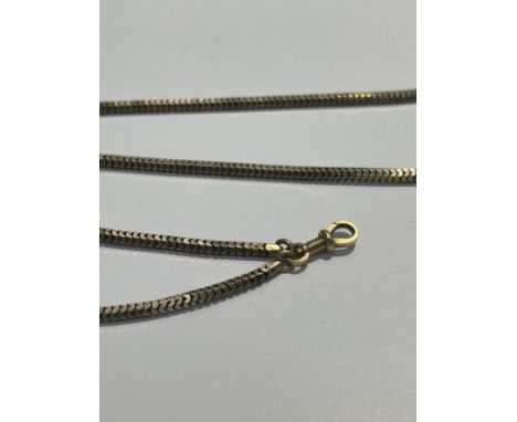A gold guard chain, unmarked, 138cm long, 39g 