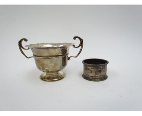 A William Hutton &amp; Son silver twin handled sugar bowl, Birmingham 1905 and a Walker &amp; Hall napkin ring, Sheffield 191