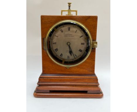 A Victorian watchman's shelf clock, dial marked Clerke, 1 Royal Exchange, London. Heavy brass chain fusee movement, with orig