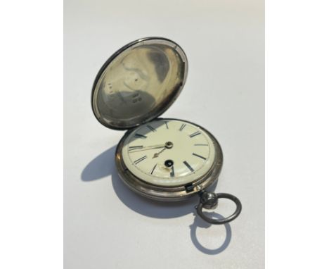 An English silver pocket watch with black Roman numerals to the white enamel face, the movement engraved "Wm Tanner, Cliffe, 