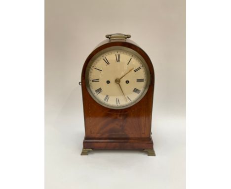 A Regency mahogany mantel clock, twin fusee movement with rack and snail striking and bell and repeat mechanism, the white en