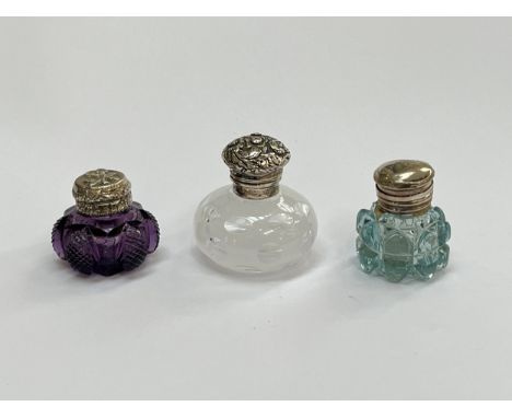 Three miniature glass scent bottles / vinaigrettes including amethyst glass and white thumb cut overlay 