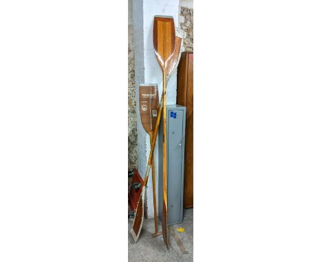 Two vintage wooden oars and a paddleLocation: 