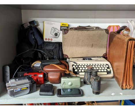 Collectables to include cameras, an HTC mobile phone, Kershaw binoculars, camera cases, vintage cases, clocks and other items