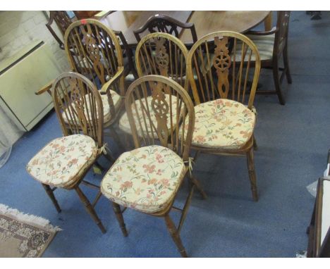 A set of five vintage elm seated Windsor wheel back dining chairsLocation: 