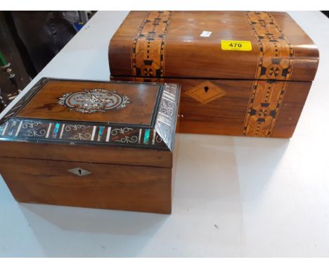 An early 20th century marquetry jewellery box, together with a Victorian walnut tea caddy with inlaid mother of pearl and oth