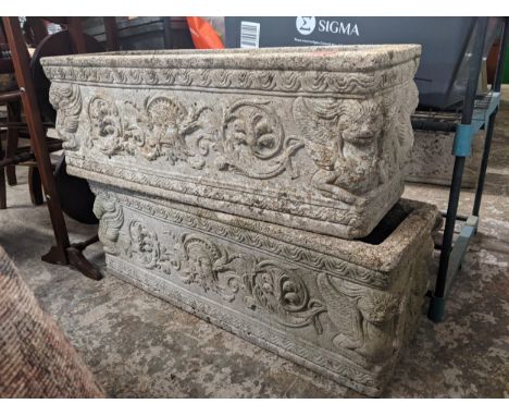 A pair of cast stone garden trough style pots with sphinx ornament, 71cm wideLocation: 