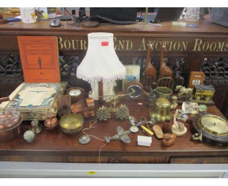 A miscellaneous lot to include two mantel clocks and a barometer, a plaster and wood table lamp, various copper and brass orn