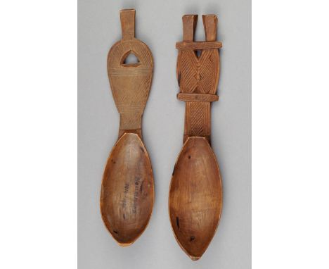 A Somali spoon wood, with carved decoration to the pierced handle, with a point finial, the bowl inscribed Somaliland 1919 - 