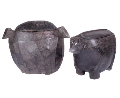 Two Ifugao zoomorphic containers Philippines both carved wood; one as a dog with ceramic fragment eyes and teeth, with a medi