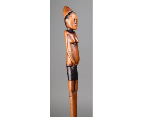 A Tsonga / Zulu staff Mozambique / South Africa carved a female figure finial with a cone shape coiffure and with her hands p