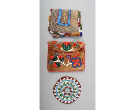 An American Indian beadwork purse woven on a cotton and wirework panel, 10cm wide, an American Indian leather and beadwork pu