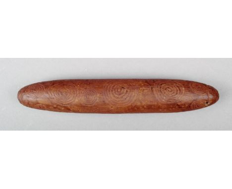 An Aborigine message stick Western Australia wood, with engraved concentric circles and dots, with red ochre, one end later p