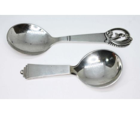 A Georg Jensen caddy spoon marked 'Sterling Denmark' and a Swedish spoon marked '830', lengths 10cm &amp; 13cm respectively. 
