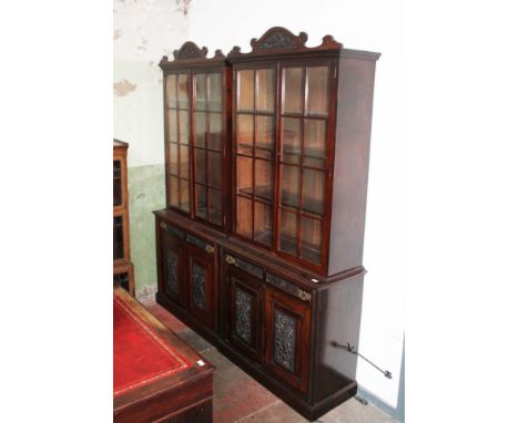 A pair of Edwardian bookcases, width 98cm, depth 42cm & height 223cm each.Some general wear to the finish to include surface 