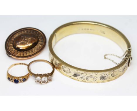 A mixed lot of jewellery comprising two hallmarked 9ct gold rings, one set with blue paste, gross wt. 3.81g, a yellow metal b