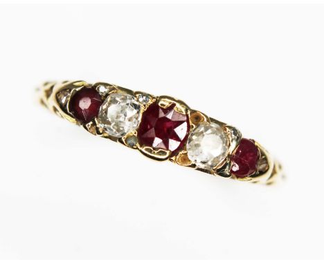 An antique diamond, ruby and garnet ring, scroll setting, hallmarked 18ct gold band, spnsor's mark and essay mark rubbed, dat