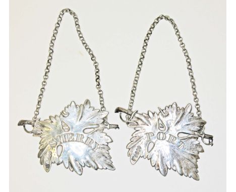 A pair of cast silver decanter labels, Port &amp; Sherry, formed as vine leaves, Charles Rawlings &amp; William Summers, Lond