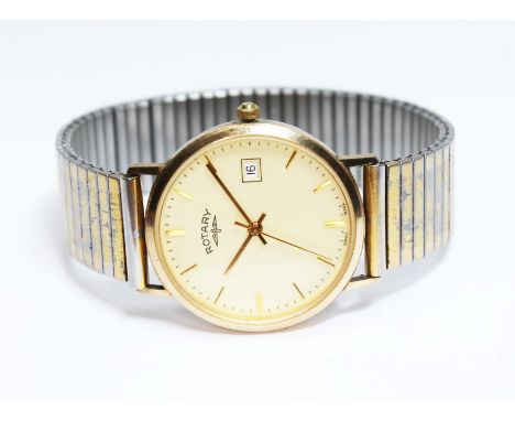 A 9ct gold Rotary railway presentation quartz watch, case diameter 34mm, gold plated sprung strap.  Condition - not currently