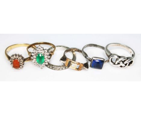 A group of six rings comprising two hallmarked 9ct gold; one set with a fire opal and the other a chrysoprase, gross wt. 5.81