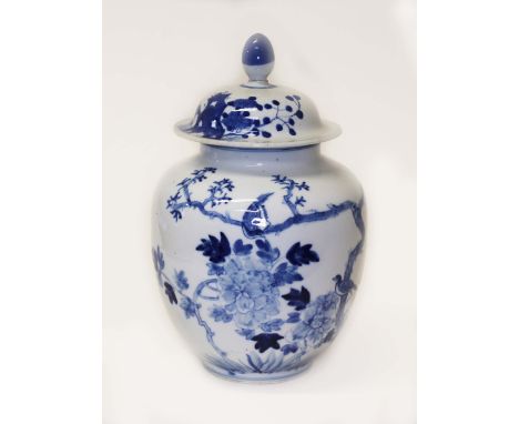 A Chinese blue and white ginger jar and cover, four character mark to base, height 25cm.&nbsp;Condition - chip to lid, finial