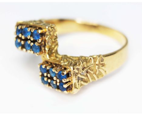 A Brutalist style ring set with blue stones, indistinctly marked, gross wt. 6.30g, size Q.  Condition - stones probably pate/