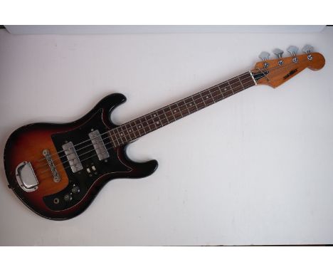 Guitar - Vintage Satellite 66/W short scale bass guitar in heavily playworn condition.  Comes with gig bag 