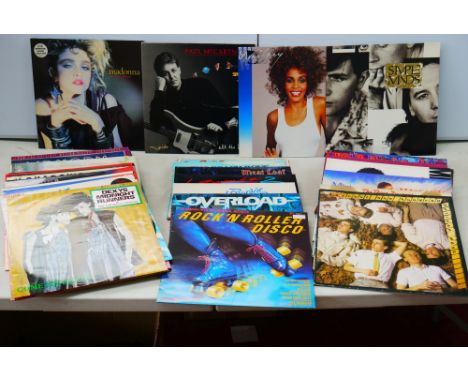 Vinyl - Around 45 LPs &amp; 12" singles to include U2 The unforgettable Fire, Michael Jackson Bad, Paul McCartney Tug of War 