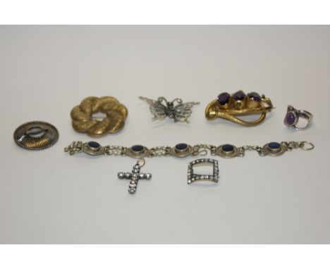 A VICTORIAN BROOCH with amethyst setting, a silver ring of stylised form, a sterling silver brooch in the form of a butterfly