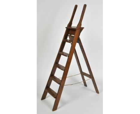 A STAINED PINE FOLDING STEP LADDER, 183cm high