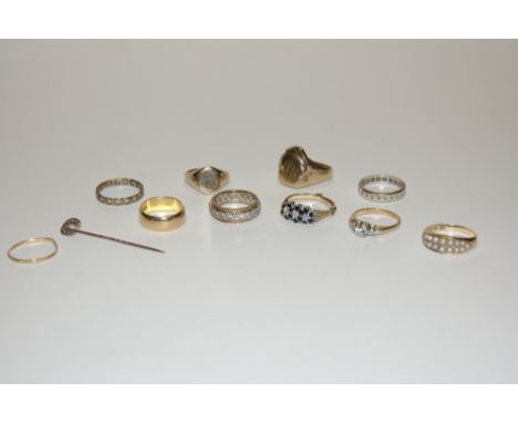 A 22CT GOLD WEDDING BAND 5 grams, a gold signet ring 6 grams, together with a collection of various other rings, and a Victor