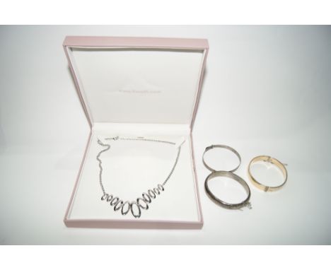 A SILVER NECKLACE by Fiorelli, stamped 925, in original presentation box, together with two silver bangles and a gold plated 