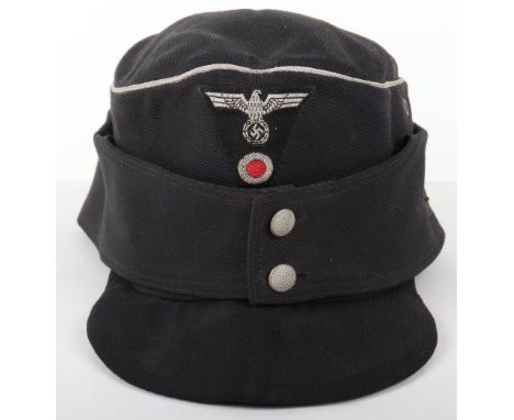 German Panzer Officers M-43 Field Cap, black ribbed cloth cap with silver bullion wire piping to the crown, two pebbled butto
