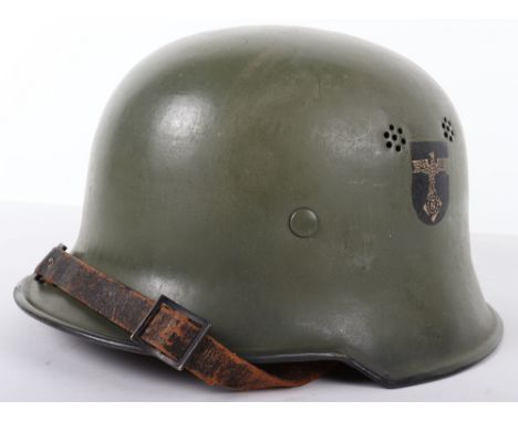 German TENO Steel Helmet, being a civilian type M-34 helmet with an apple green paint finish to the exterior. TENO organisati