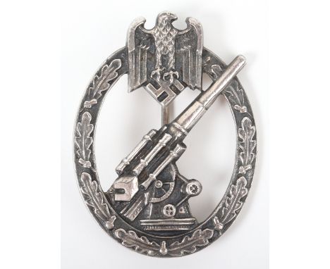 German Army Flak Badge, complete with pin and catch fixing to the reverse. Makers mark “A.G.M Uk gablonz” also to the reverse