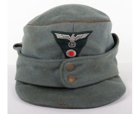 German Army Generals M-43 Field Cap, doeskin wool body cap with golden wire piping to the crown. One piece silver metallic wi