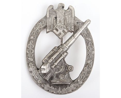 German Army Flak Badge, complete with pin and catch fixing to the reverse. Scooped out flak gun to the reverse. No makers mar