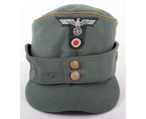 German Army Mountain Troops Generals Begmutze Cap, doeskin wool body with golden wire piping to the crown. One piece T shaped
