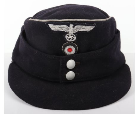 Kriegsmarine Administration Officers M-43 Field Cap, dark navy blue wool body with silver bullion wire piping to the crown. B