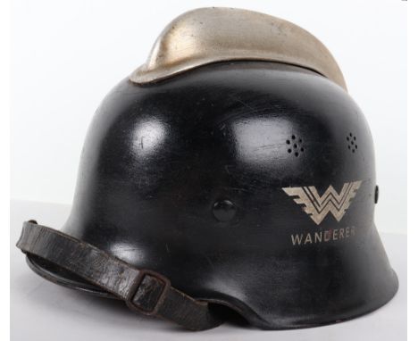 German Factory Fire Brigade Steel Helmet, being a standard fire brigade pattern steel helmet with comb top. To each side is f