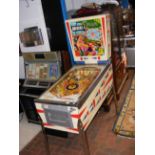 A vintage 'Funland' pin ball machine in working or