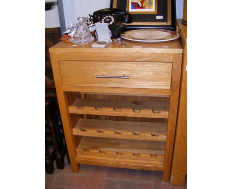 A contemporary light oak wine rack with drawer above (matching Lot 309) - width 60cm 