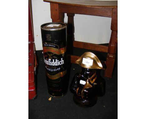 A boxed Glenfiddich Malt Scotch Whisky, together with a Napoleon Brandy in novelty bottle