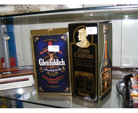 A bottle of Glenfiddich 18 Year Old Scotch Whisky and a bottle of Gran Capitan Brandy  CONDITION REPORT In our judgement, the