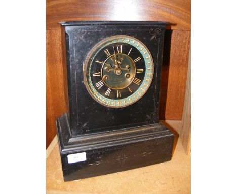 A Victorian slate mantel clock with visible escapement - bearing mark J & L Mole - 34cm high 