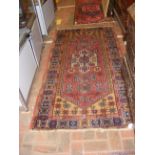 A Middle Eastern rug with geometric border - 190cm